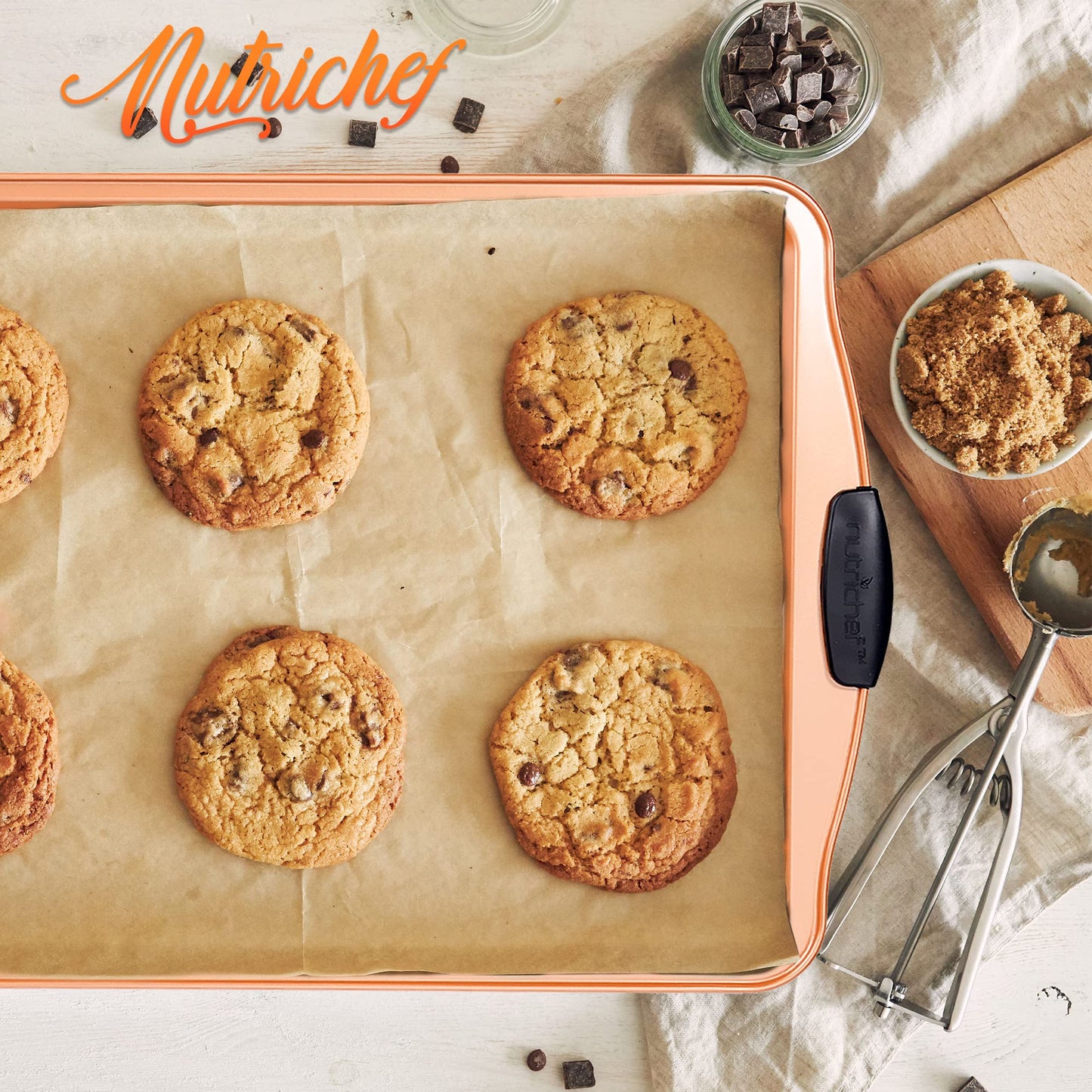 Nutrichef 15” Nonstick Cookie Sheet for Baking - Premium Grade Carbon Steel Non-Stick Baking & Roasting Pan w/ Silicone Handles - Dishwasher Safe, Copper